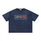 Navy blue t-shirt with 'CAPTIVATED' text on a white background