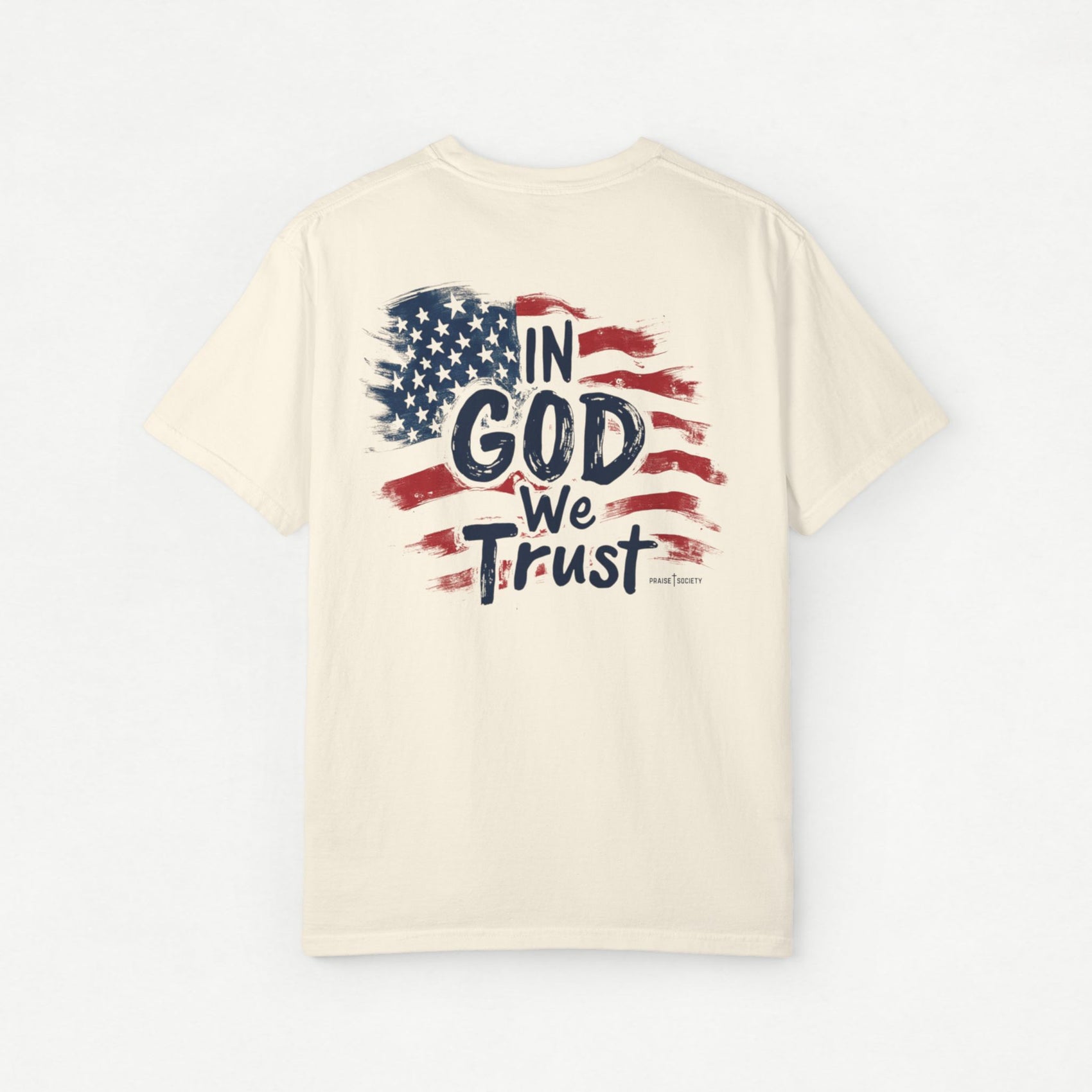 Beige t-shirt with 'In God We Trust' graphic on a white background