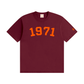 Maroon t-shirt with '1971' printed in orange on a white background