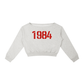 Gray cropped sweatshirt with '1984' printed in red on a white background