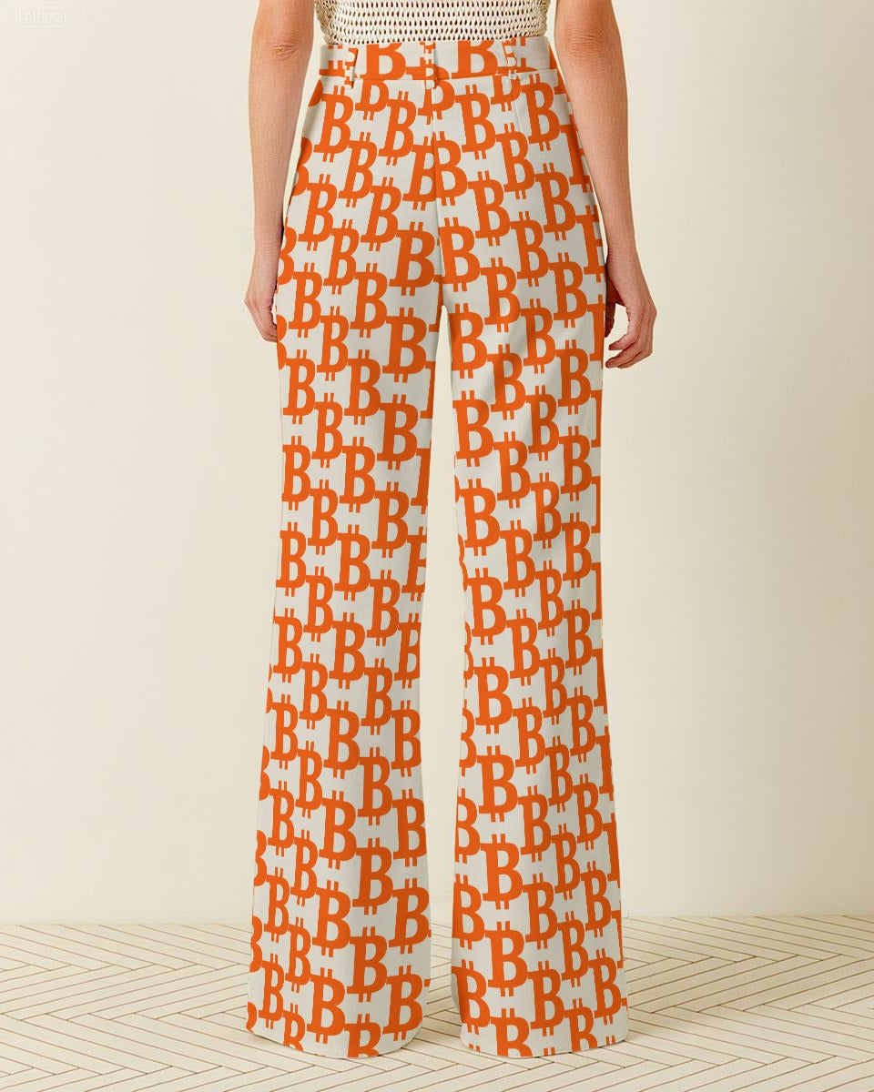 Person wearing orange and white patterned pants on a plain background