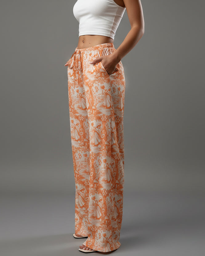 women wearing orange bitcoin rabbit hole pants - svrn society