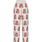 back of cream pants with 'Tax Rich' text pattern on a white background