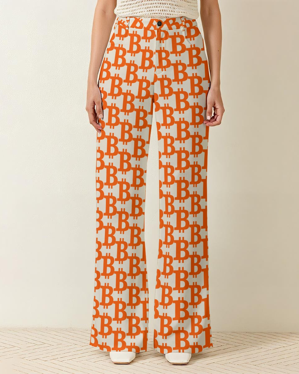 Person wearing orange and white patterned pants on a beige background