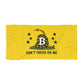 Bitcoin beach towel: A yellow Gadsden flag-style towel or mat featuring a coiled rattlesnake with a Bitcoin symbol in the center, surrounded by five black stars and the text 'DON'T TREAD ON ME' in black. The product is photographed flat against a plain white background.
