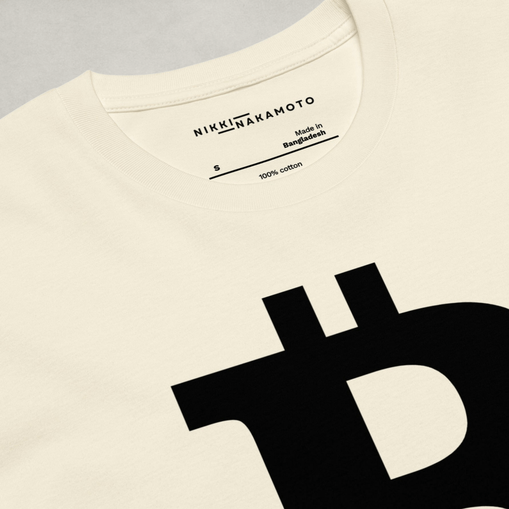 Front close-up image of the Womens Premium Bitcoin T-Shirt from The B Collection by Nikki Nakamoto in cream and black