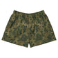 A pair of camouflage shorts featuring a green and brown camo pattern with large Bitcoin symbols integrated into the design, displayed flat against a solid white background.
