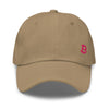 khaki dad hat with a pink Bitcoin B on it by Nikki Nakamoto at The Orange Habit