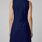 Navy blue sleeveless dress with green patterned neckline on a gray background