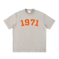 Gray Bitcoin t-shirt with '1971' printed in orange on a white background