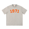 Gray Bitcoin t-shirt with '1971' printed in orange on a white background