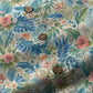 Close-up of a tropical floral patterned shirt with buttons.