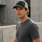 Black and tan 1971 trucker cap urban lifestyle portrait