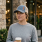 Denim and tan 1971 trucker cap cafe lifestyle portrait