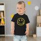 Toddler boy standing and wearing a Satoshi Smiles Black Toddler Bitcoin Tee - Lil'B - The Orange Habit