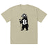 Beige green oversized t-shirt with a honey badger holding a Bitcoin symbol on a white background - SVRN Society