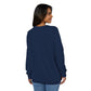 Woman wearing a (navy) blue long-sleeve shirt on a white background