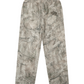 Kayfabe fleece sweatpants in tree camo with small logo on back pocket area, back view