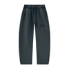SVD vintage wash barrel leg sweatpants in navy blue with drawstring and SVD print, front view