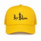SVRN Society yellow foam trucker cap with Buy Bitcoin embroidery and breathable mesh back, front view.