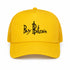 SVRN Society yellow foam trucker cap with Buy Bitcoin embroidery and breathable mesh back, front view.