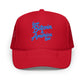 Red cap with blue text 'loves Bitcoin & America too' on a white background